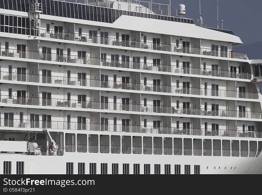 White Cruise Ship Anchored In Port