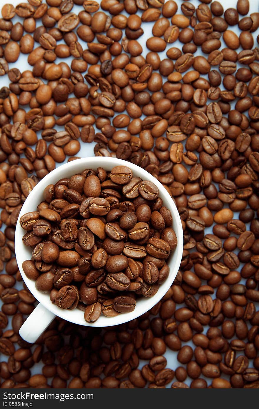 Coffee Beans Background With White Cup