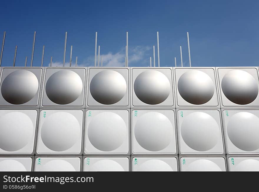 Stainless steel water tank and blue sky