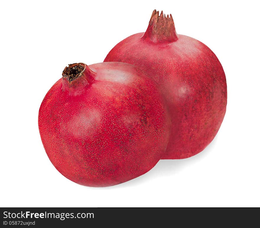 Pomegranate fruits closeup isolated on white background