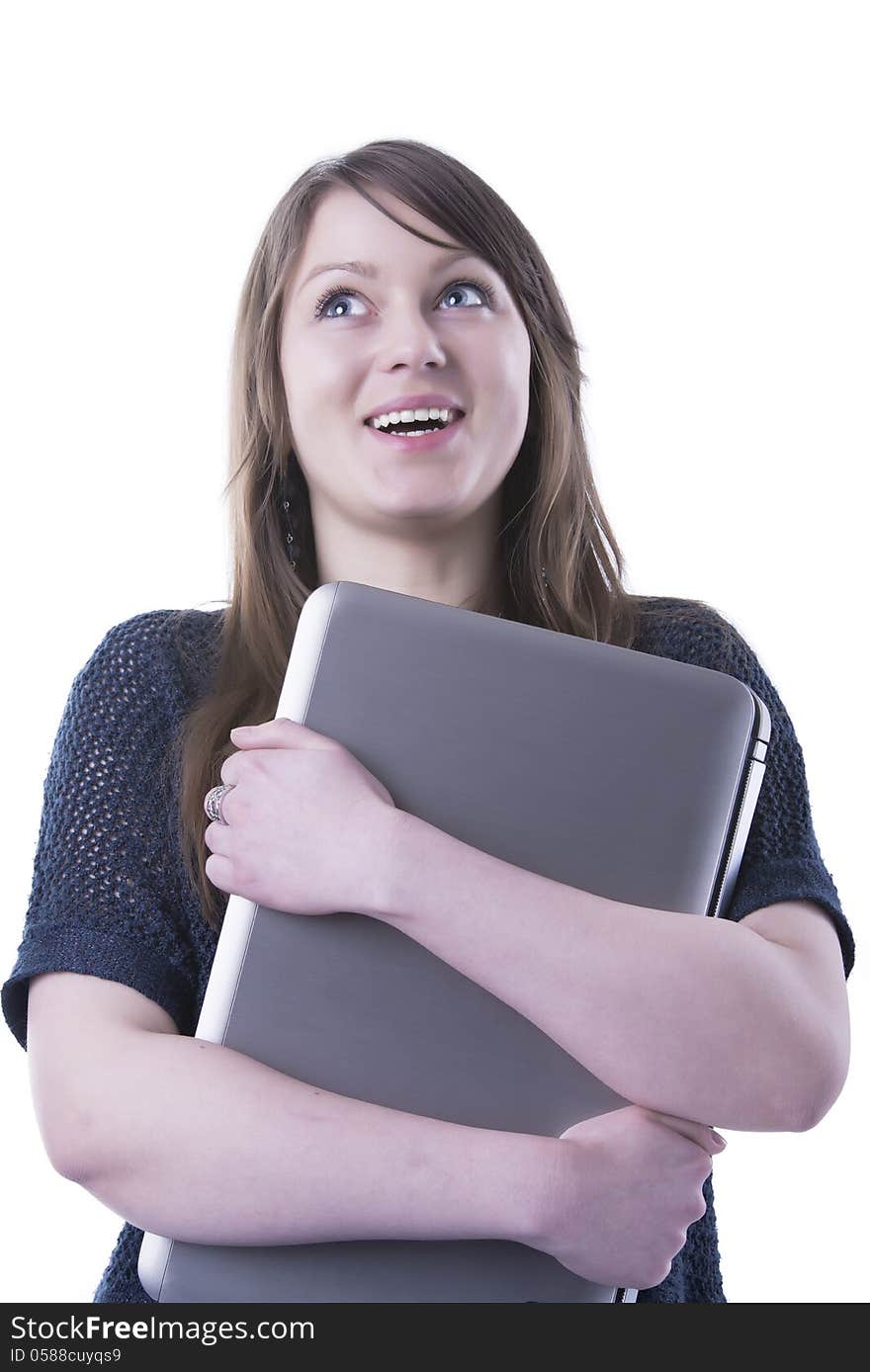 Casual student with computer in her lap. Isolated in our studio. Casual student with computer in her lap. Isolated in our studio.