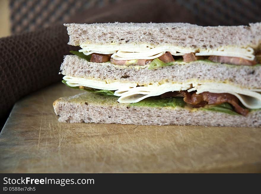 Close up layer of chicken and bacon baga bread sandwich. Close up layer of chicken and bacon baga bread sandwich