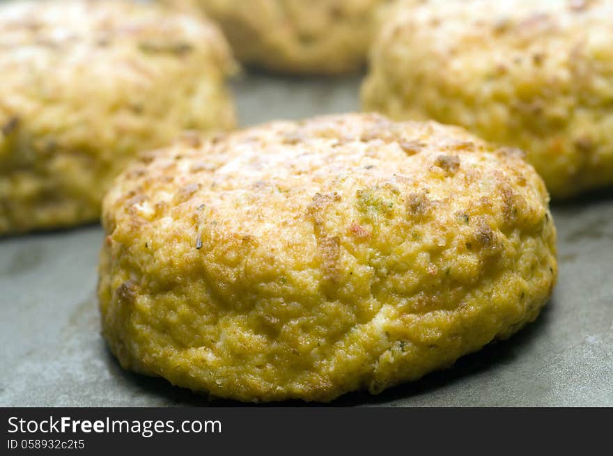 Lobster cakes on baking pan uncooked