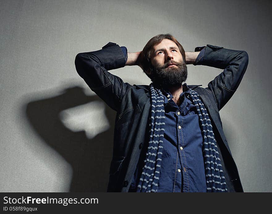 Portrait of the young man with a big beard and mustaches