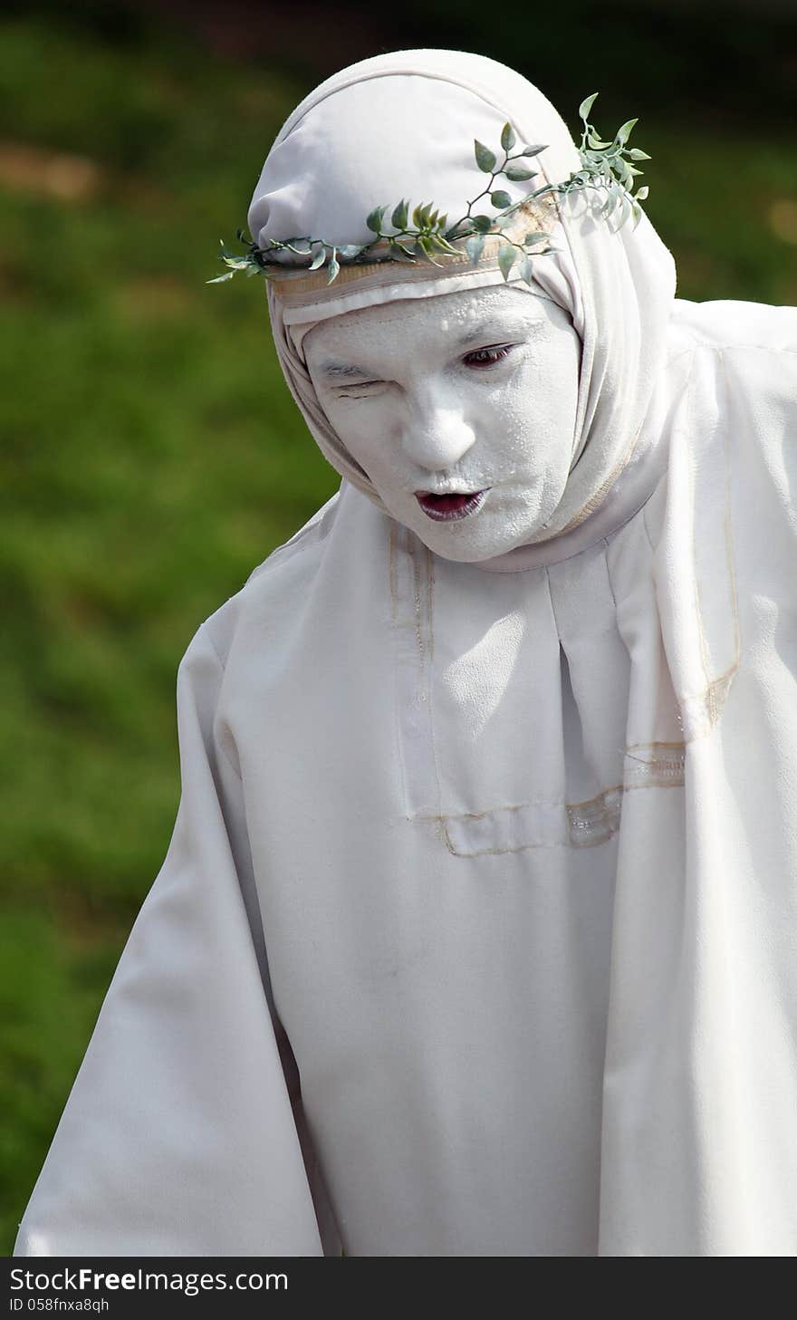 Person In Roman Toga Costume At Carnival Party