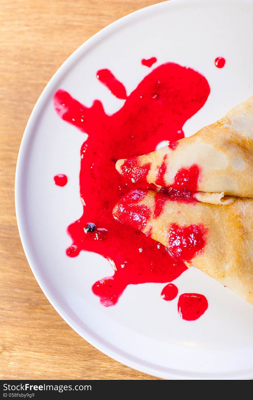 One fried pancake against the white background