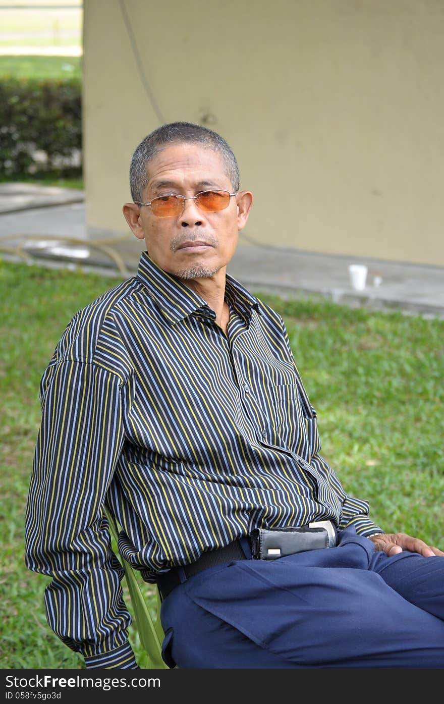 Portrait of a Malaysian senior citizen.