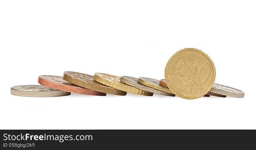 Euro cent coin on white background and other coins dominated. Euro cent coin on white background and other coins dominated