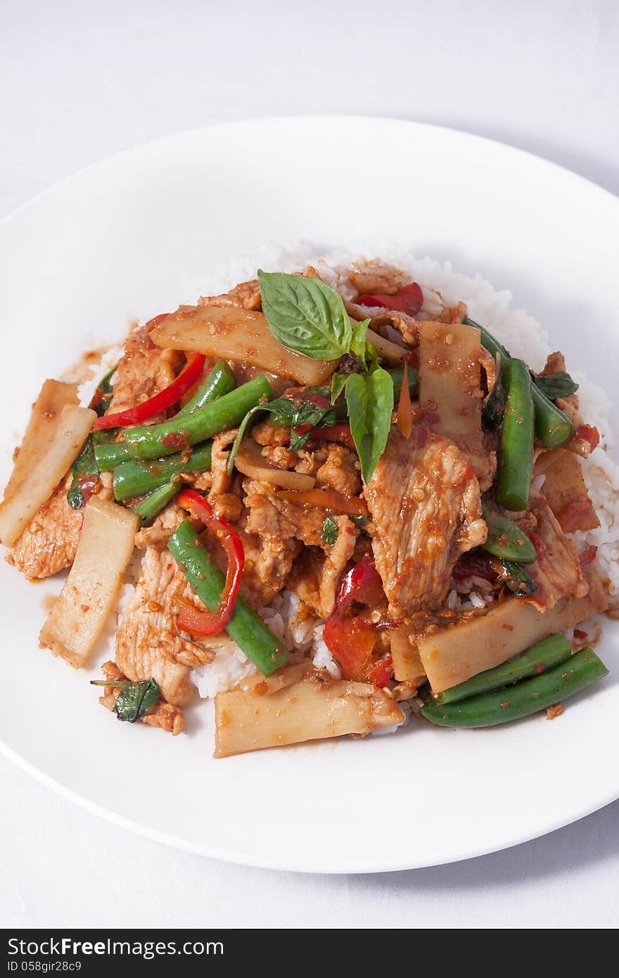 Thai spicy food, stir fried chicken whit basil and rice.