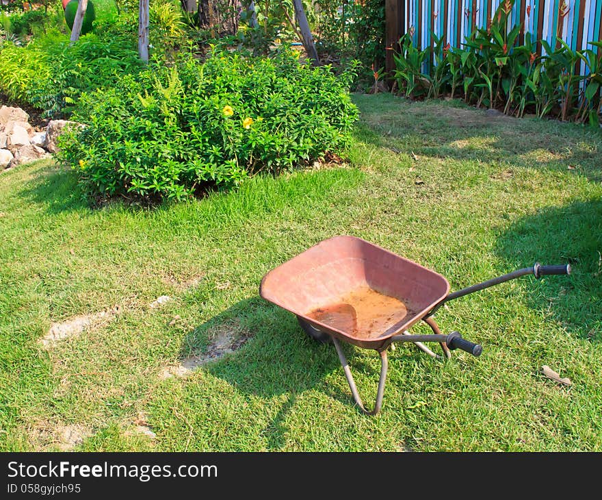 The wheelbarrow in the garden