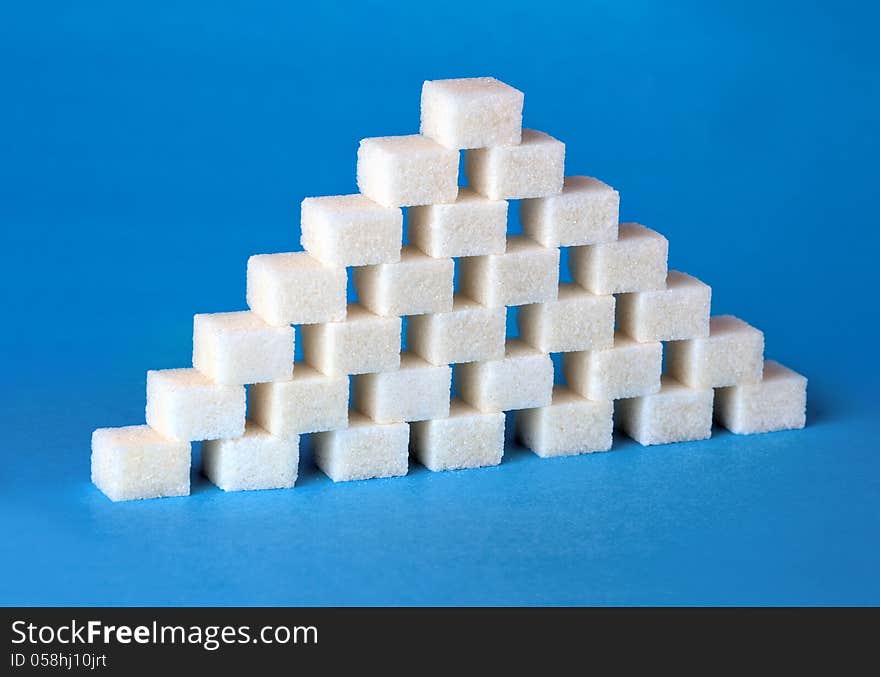 Pyramid made ​​of sugar cubes. Pyramid made ​​of sugar cubes