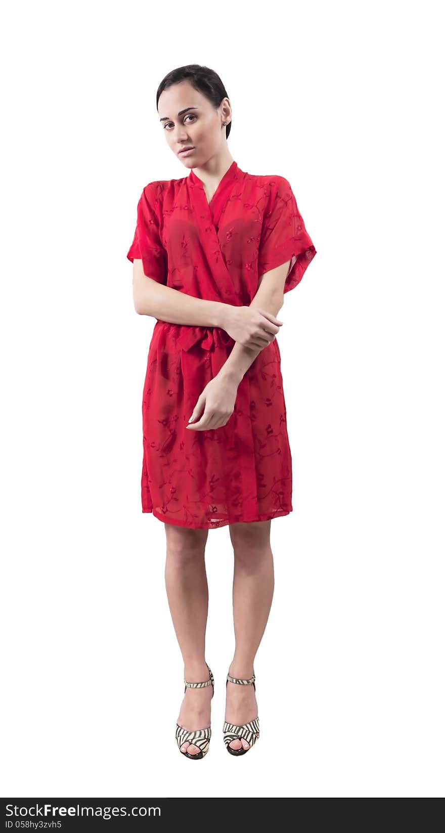 Young girl in red dressing gown isolated white