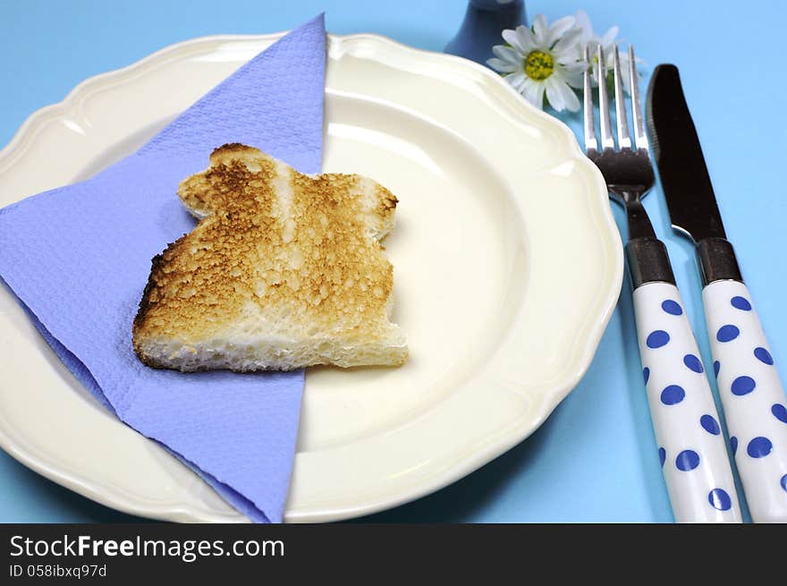 Blue theme Happy Easter breakfast table with bunny rabbit toast - Close-up