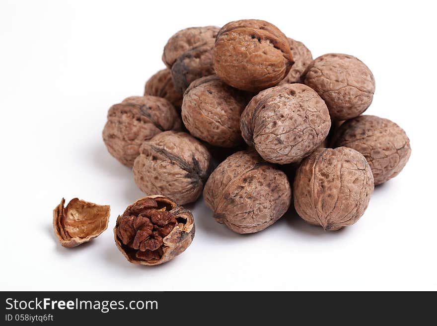 Uglans is a plant genus of the family Juglandaceae, the seeds of which are known as walnuts. They are deciduous trees, 10–40 meters tall (about 30–130 ft), with pinnate leaves 200–900 millimetres long (7–35 in), with 5–25 leaflets; the shoots have chambered pith, a character shared with the wingnuts (Pterocarya), but not the hickories (Carya) in the same family.