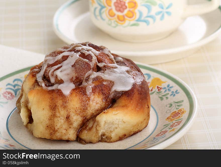 Closeup of a homemade cinnamon roll on a plate