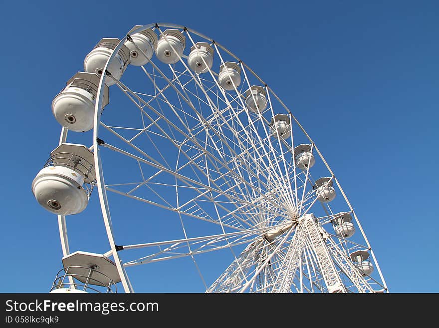 The White Carriages of a Fun Fair Big Wheel Ride.