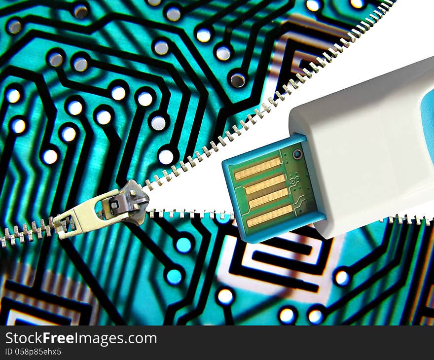 Photo showing a pcb board being unzipped to reveal a digital memory stick for computing purposes. Photo showing a pcb board being unzipped to reveal a digital memory stick for computing purposes.