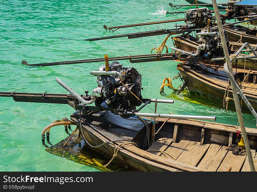 Rear side of wooden long tail boat with engine. Rear side of wooden long tail boat with engine