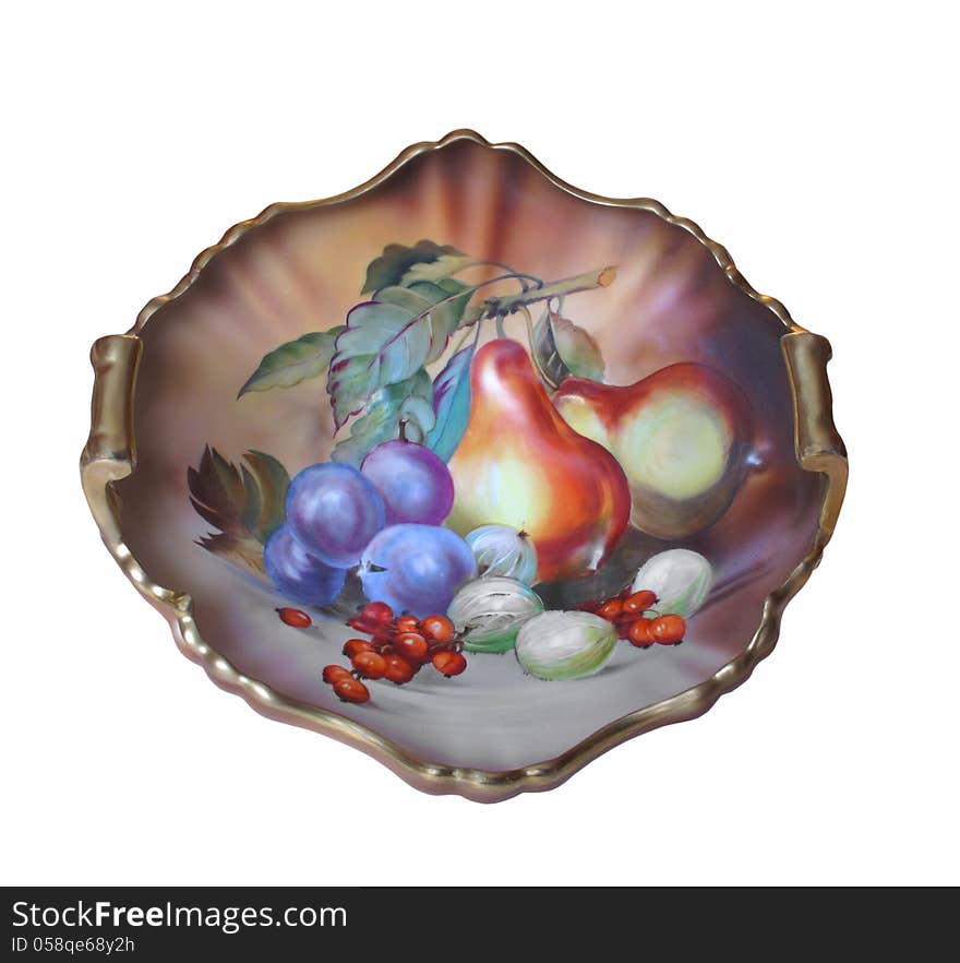 Antique hand painted porcelain platter, with decorations of flowers and fruit. Isolated on white. Antique hand painted porcelain platter, with decorations of flowers and fruit. Isolated on white.