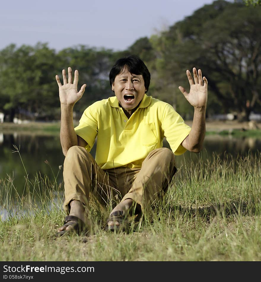 Happy man in summer park