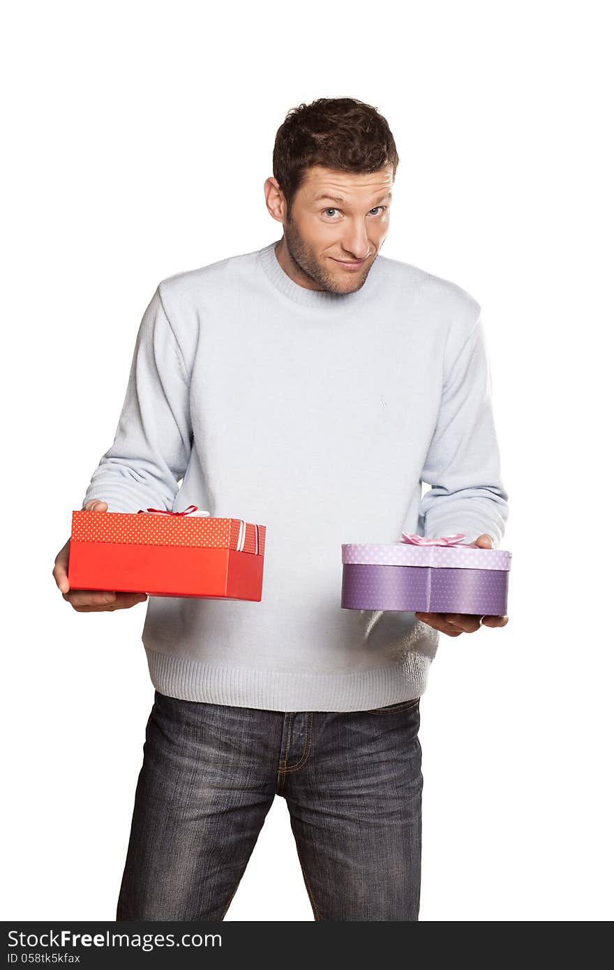 Handsome Man Offering A Present On White Background. Handsome Man Offering A Present On White Background