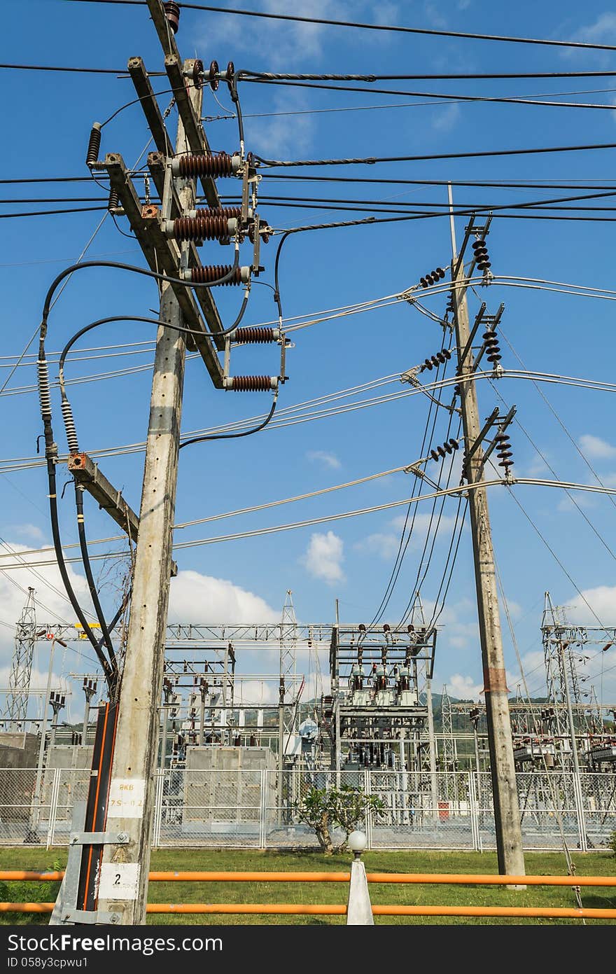 Electric power station and high-tension post with blue sky