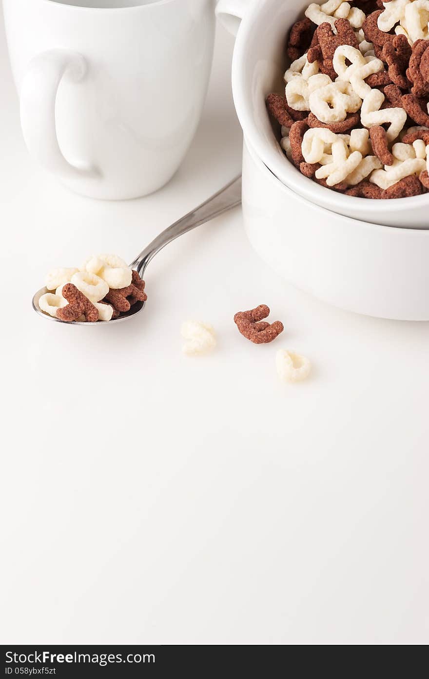 Alphabet cereal in the white bowl, vertical