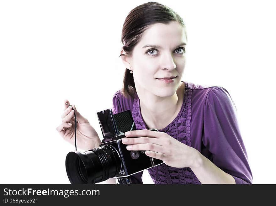 Beautiful young woman with old camera. Beautiful young woman with old camera