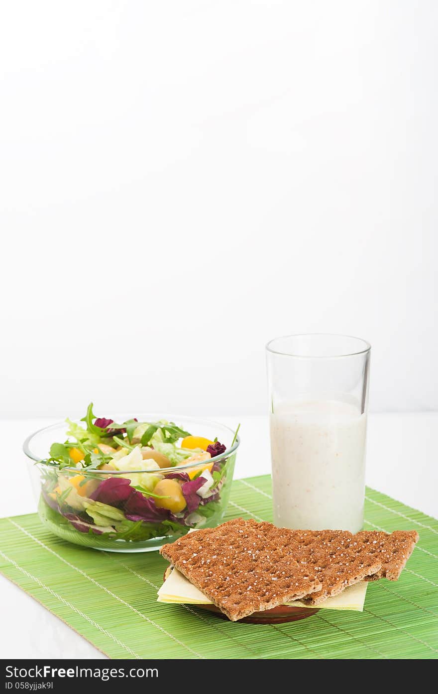 Vegetable salad with diet biscuits and glass of yogurt. Vegetable salad with diet biscuits and glass of yogurt