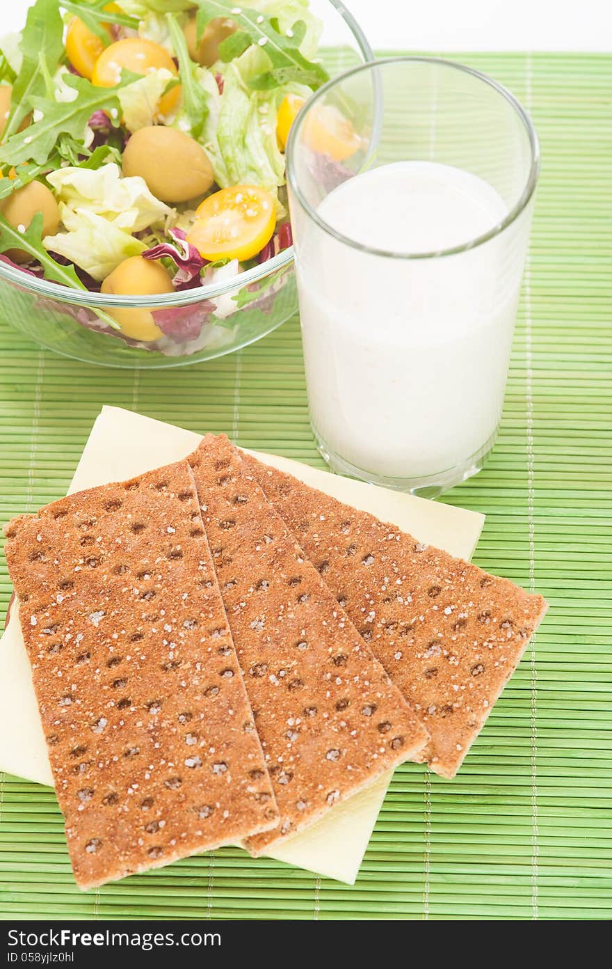 Vegetable salad with diet biscuits and glass of yogurt. Vegetable salad with diet biscuits and glass of yogurt