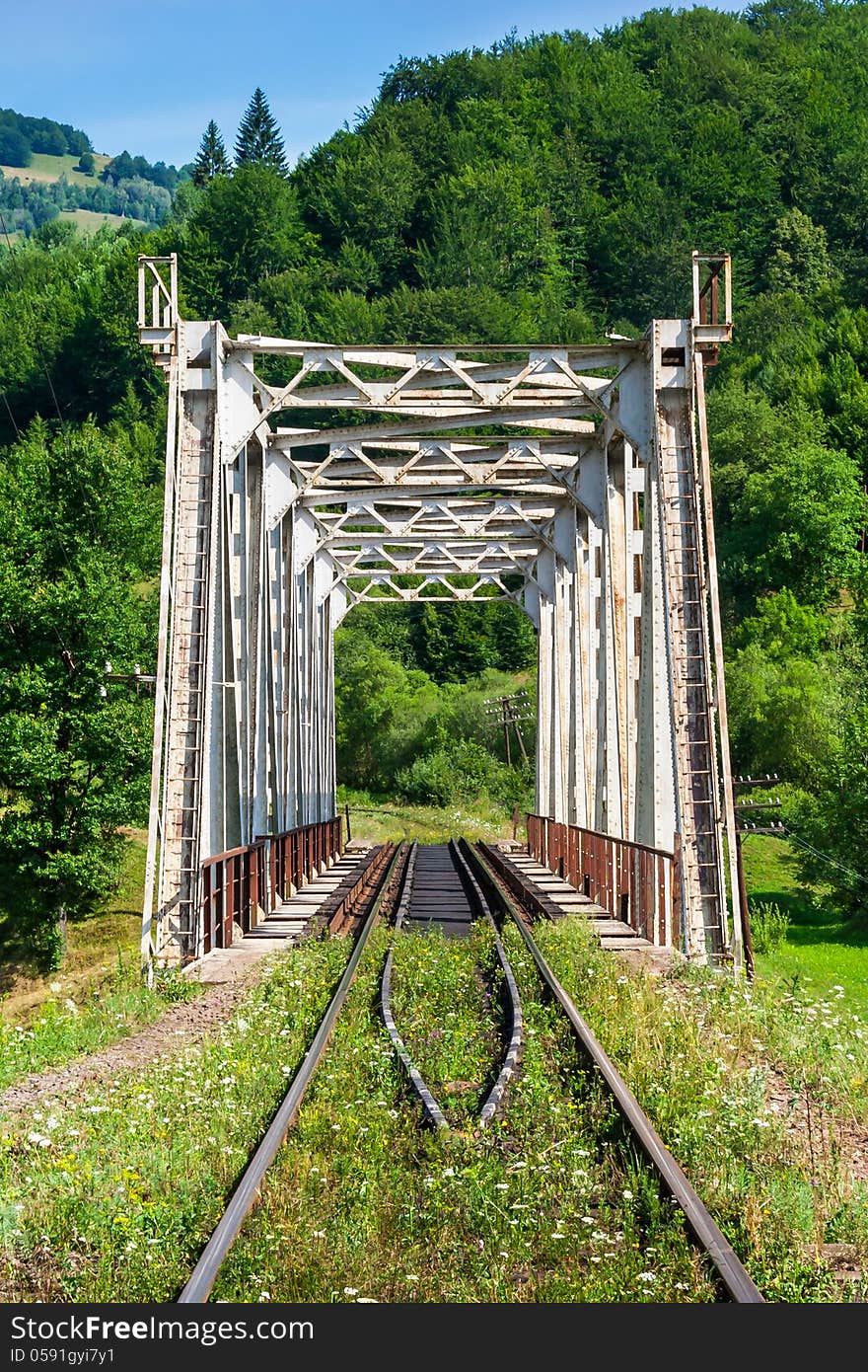 Metal bridge in mountains