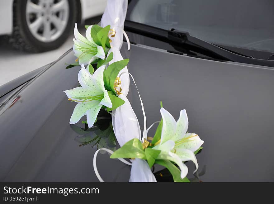 Wedding car decoration. Wedding cortege, delivers the groom and the bride to the wedding site