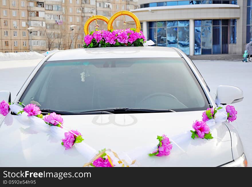 Wedding car decoration. Wedding cortege, delivers the groom and the bride to the wedding site