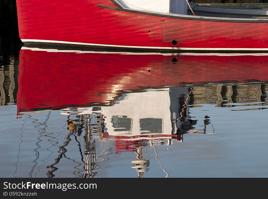 Red Boat Reflection