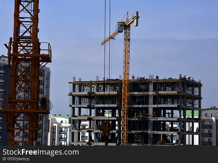 People working and building construction, crane