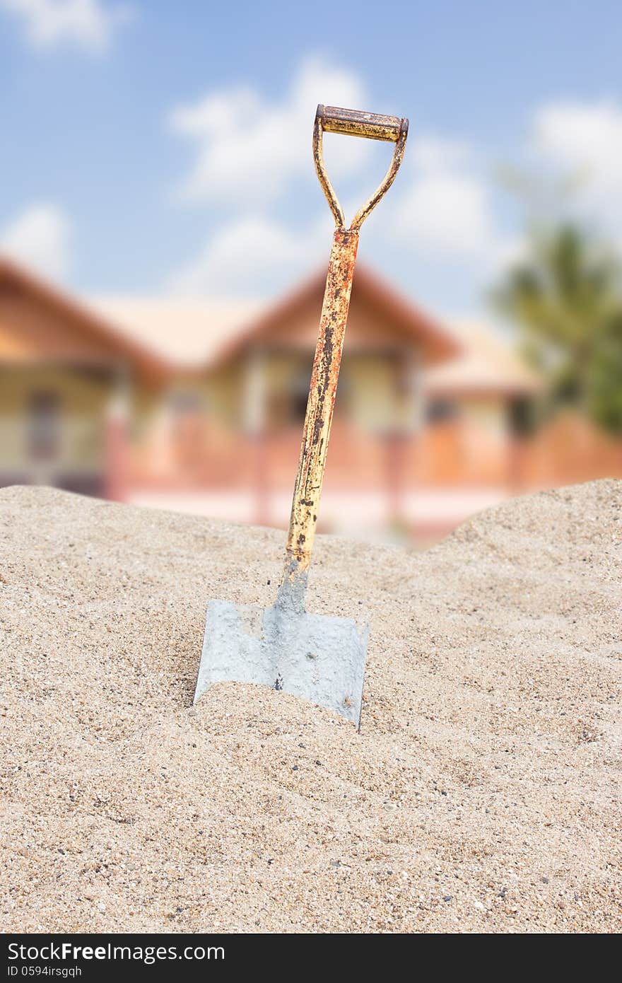 Shovel On Sand For House Construction in Thailand