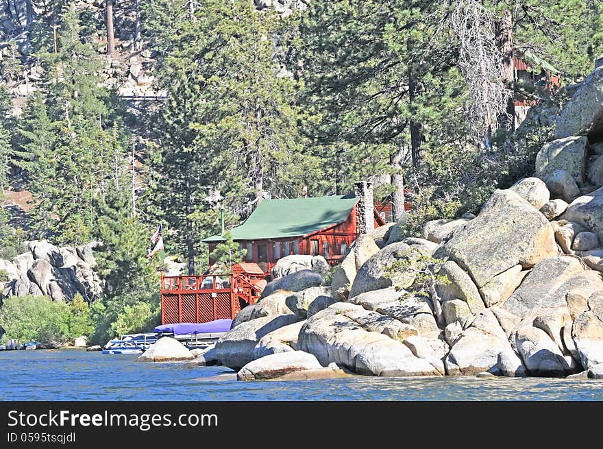 This is a summer cabin built at the west end of Big Bear Lake in a section of large boulders and pine trees. This is a summer cabin built at the west end of Big Bear Lake in a section of large boulders and pine trees.