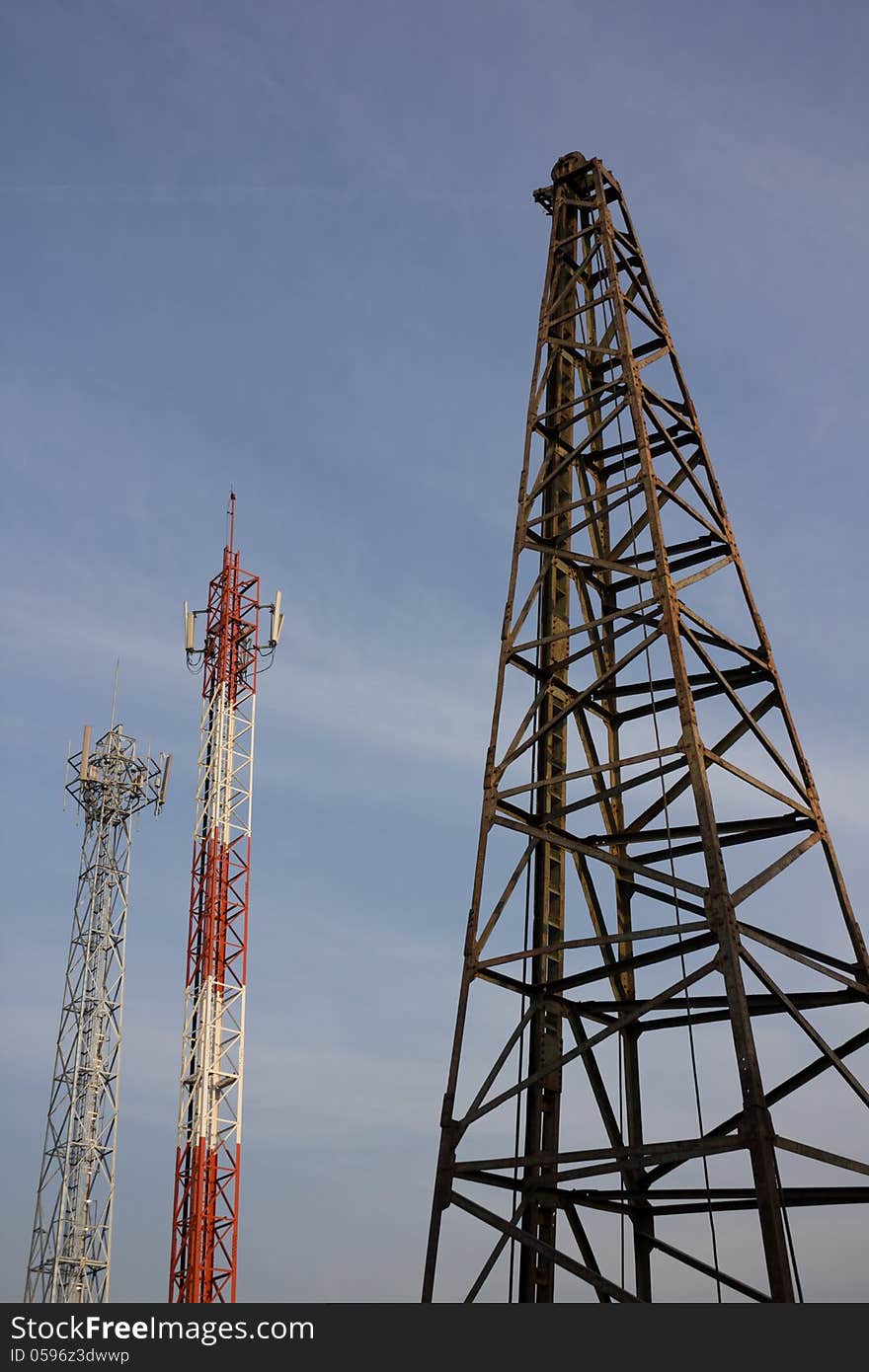 Utility pole and  lifting machine in construction site