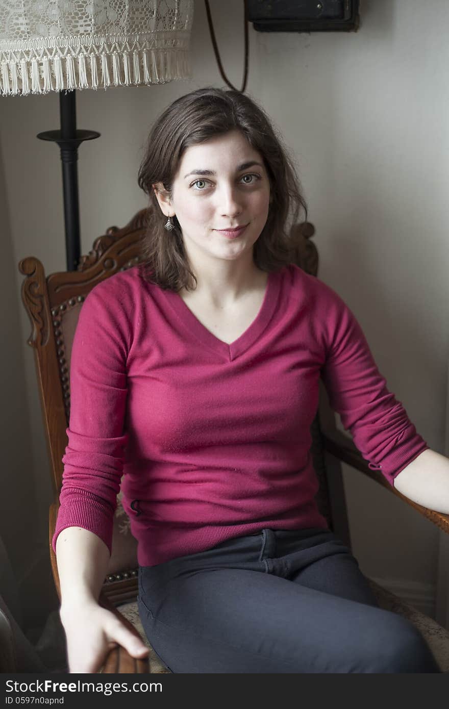 Portrait of a young woman looking directly at the camera. Portrait of a young woman looking directly at the camera