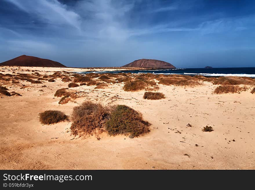 La Graciosa small volcanic island North from Lazarote, Canary. La Graciosa small volcanic island North from Lazarote, Canary