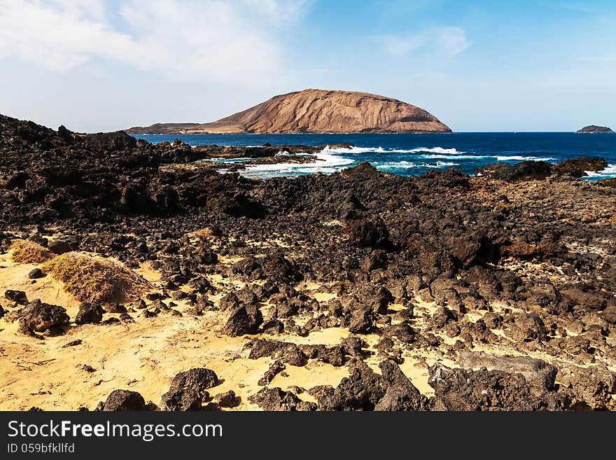 La Graciosa small volcanic island North from Lazarote, Canary. La Graciosa small volcanic island North from Lazarote, Canary