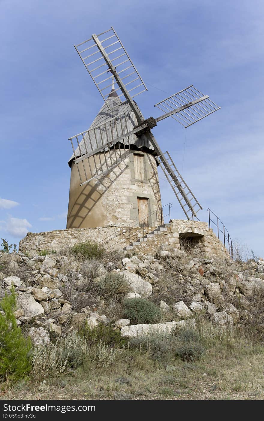 Windmill in France during summer.