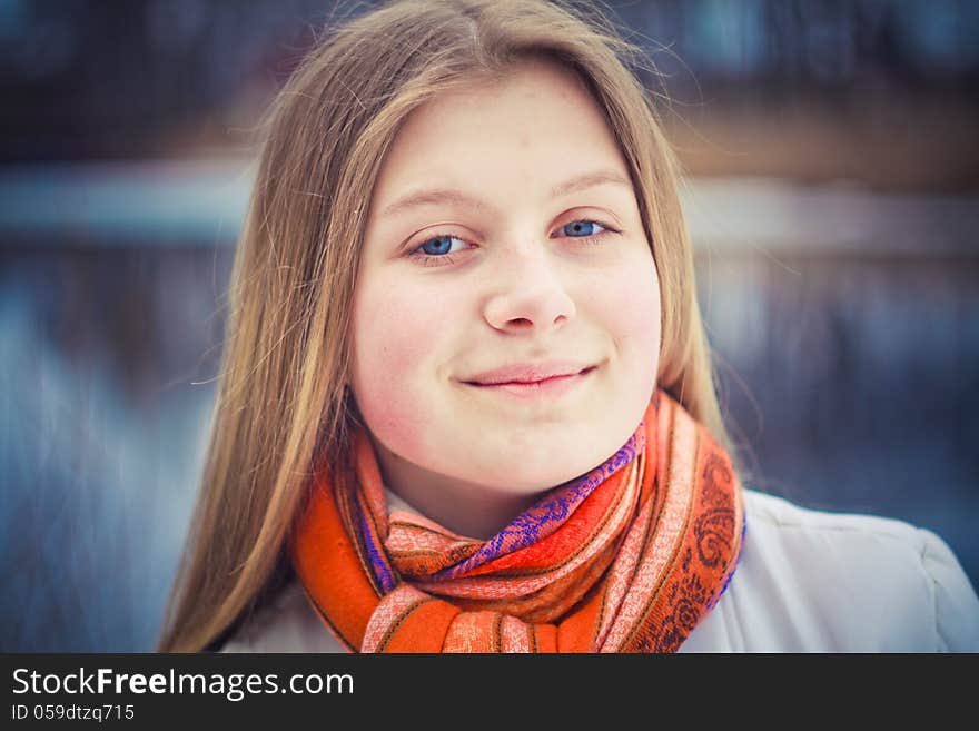 Teen Girl Wearing Orange Scarf In Windy Day. Teen Girl Wearing Orange Scarf In Windy Day