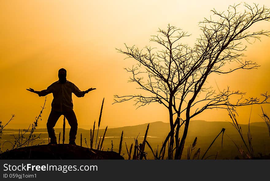 Praying man silhouette