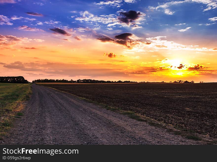 Sunset and rural road.