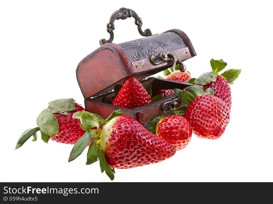 Treasure chest with strawberry isolated on white. Treasure chest with strawberry isolated on white