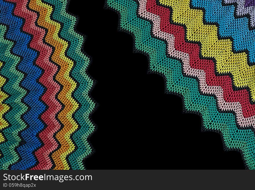 Detail of colorful knitted blankets pillows. Detail of colorful knitted blankets pillows