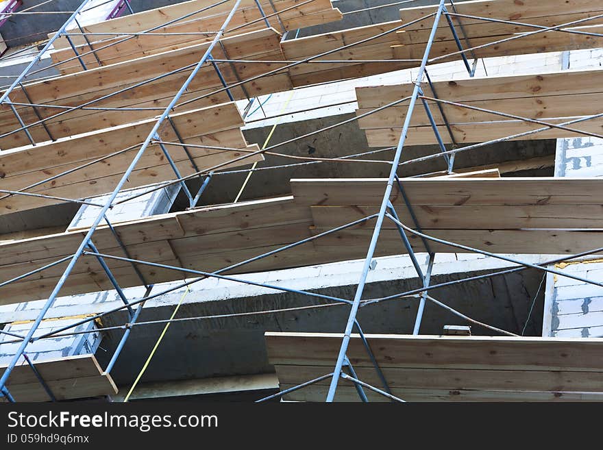 Concrete wall with scaffolding