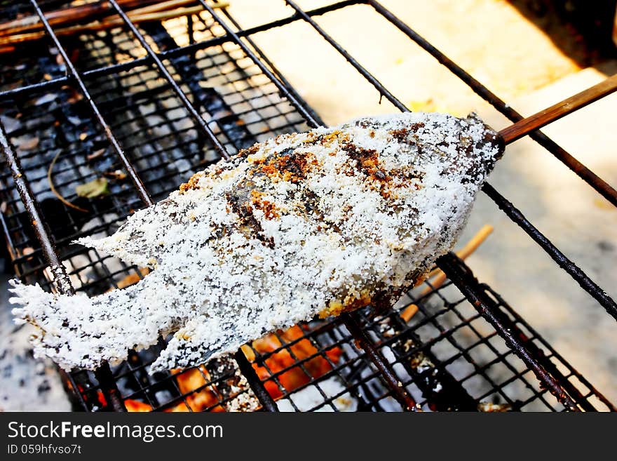 Salt fish on the stove background. Salt fish on the stove background