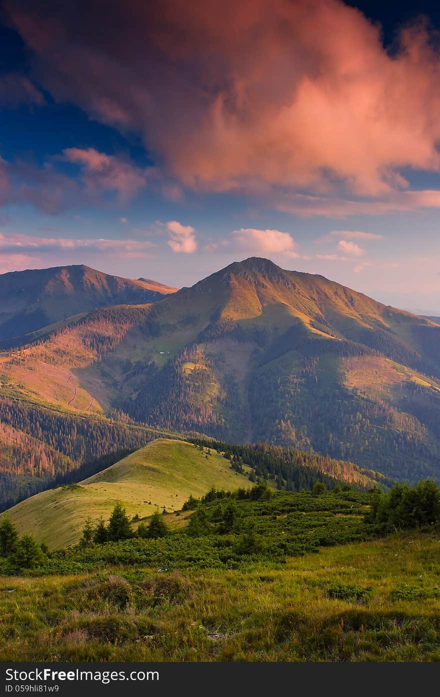 Evening Landscape in the mountains with beautiful red clouds. Evening Landscape in the mountains with beautiful red clouds